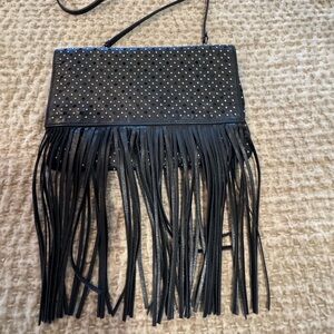 Uterque brand black clutch with studs and fringes. Fashionable and lightweight
